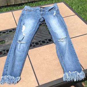 Express jeans light wash with ankle fringe